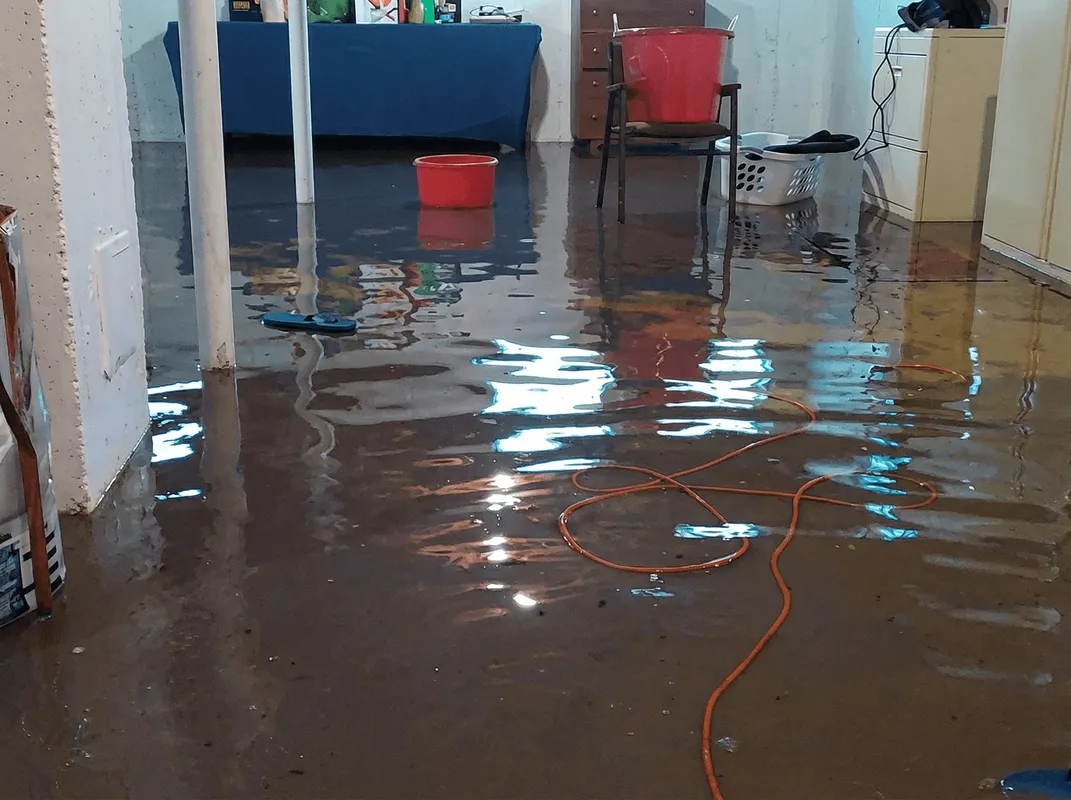 Basement with boiler, cabinets and washing machine completely flooded in Glendale, AZ